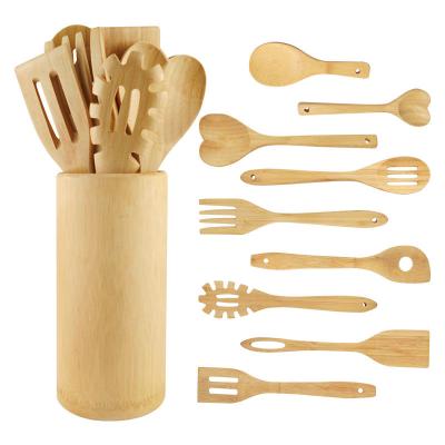 China Sustainable Kitchen Accessories Set Wooden Utensil 10 Piece Bamboo Cookware Set With Rack for sale