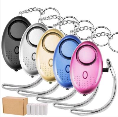 China Personal Alarm / Night Lighting Hot Selling Amazon Anti Attack 130dB Security Personal Pepper Spray Self Defense Alarm Key Chain For Kids Lady for sale