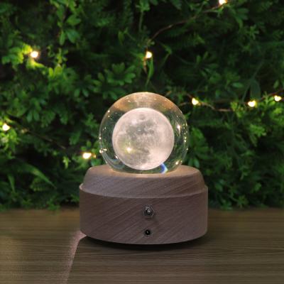 China Zhongshan Hot Selling Bed Room Wooden Base 3D Crystal Ball Light With Rotating Music Gift Table Lamp For Friend for sale