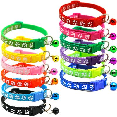 China Designer Nylon Pet Dog Cat Collar With Bell Paw Print Reflective Neck Adjustable Multi-colors Lights Factory Wholesale for sale