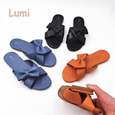 China New Fashion Cross Upper Flat Sandals Ladies Flat Slippers for sale