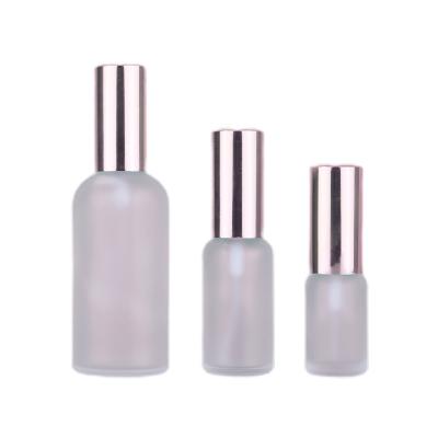 China Used for packaging liquid products such as 50ml-100ml cosmetic empty smudge packing materials bottle of alcohol and perfume rose gold cherry blossom powder transparent frosted glass spray bottle for sale