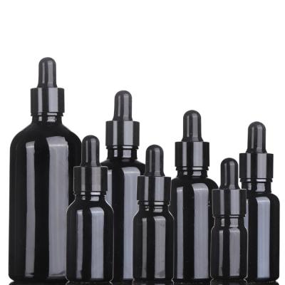 China 5ml-100ml Essential Oil Cosmetics Packaging Material Amethyst Black Porcelain Essential Oil Filling Empty Bottle Dropper Black Glass Bottle for sale