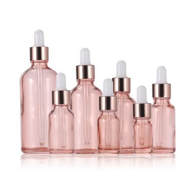 China 5ml-100ml Essential Oil Cosmetic Packaging Materials Filled Empty Cherry Blossom Powder Translucent Rose Gold Glass Dropper Bottles for sale