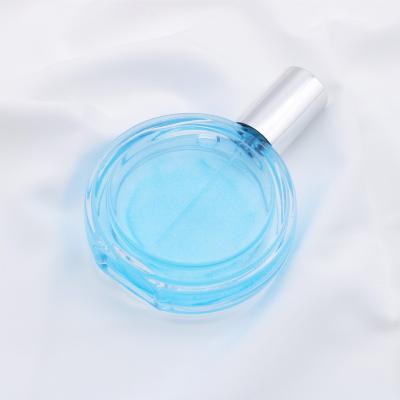 China Eco-friendly Cute Glass Cosmetic Package 50mL Free Sample Empty Clear Luxury Perfume Spray Bottles With Screw Top for sale