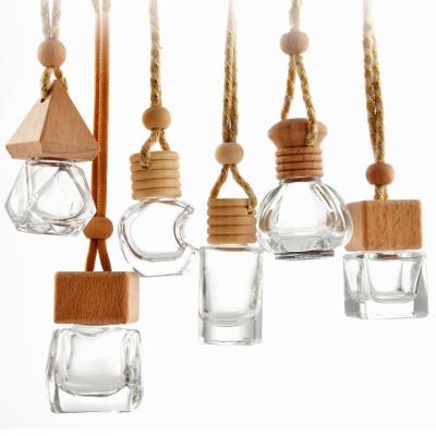 China Eco-friendly Square Classic Empty Cosmetic Clear Glass Air Freshener Car Perfume Aroma Diffuser Hanging Bottle for sale