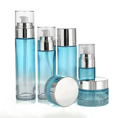 China Luxury Eco-friendly Cosmetics Packaging Glass Set Empty Glass Jar And Pump Bottles 40ml 80ml 100ml Lotion Cream Toner Bottle For Skin Care for sale