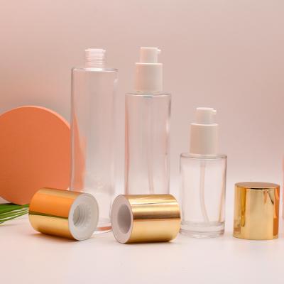 China Wholesale Custom Clear Color Eco-friendly Round Empty Bottle For Skin Care Cream Lotion 40ml 100ml 120ml Glass Toner Pump Bottles for sale