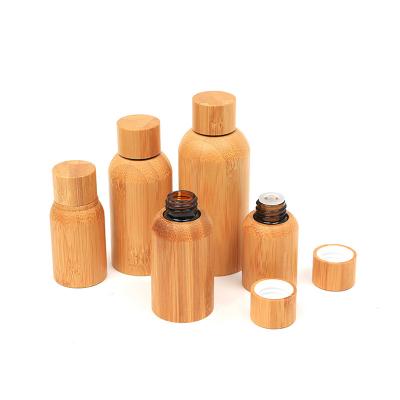 China Eco-Friendly Design 5ml 30ml 100ml Full Bamboo Glass Dropper Bottles For Skin Care Amber Glass Essential Oil Stopper Empty Bottle for sale