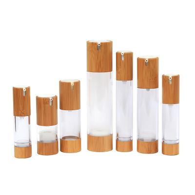 China Hot Sale 30ml Eco-friendly Acrylic Cylinder Bamboo Wooden Vacuum Bottle Packaging Cosmetic Empty Lotion Bottle Plastic Airless Pump for sale