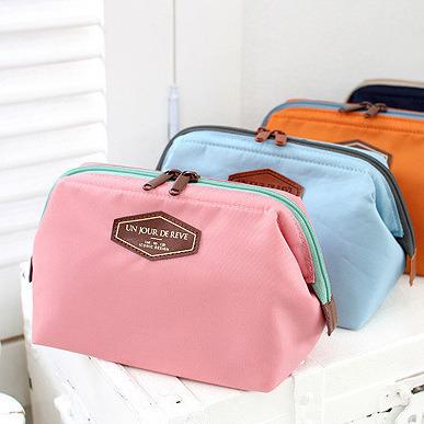 China Fashion Storage Bag Cotton Wash Bag Explosion Style Portable Large Capacity Steel Frame Cosmetic Bag for sale