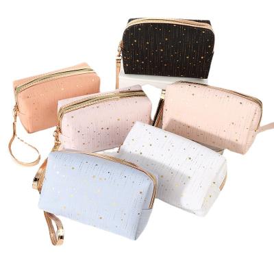 China Fashion 2021 raining cosmetic pouch star bag silk tan octagonal storage zipper cosmetic stain wash bag for sale