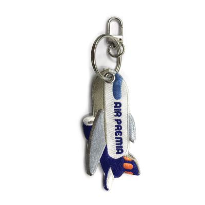 China 2021 Viable Hot Selling Wholesale Fits Every Garment 100% Polyester Embroidered Key Chain for sale