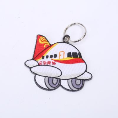 China 2021wholesale hot sale viable customizes every garment and shoe cap 100% polyester material embroidered key chain for sale