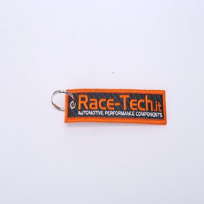 China Viable Key Chain Wholesale No Min Custom Fabric Embroidered Key Chain for sale