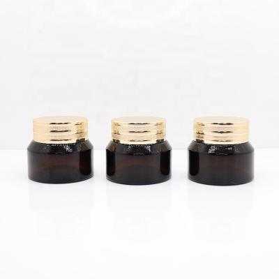 China Hot Sale 30g Personal Care Round Glass Cosmetic Cream Jars With 30g Screw Lid Amber Glass Container for sale