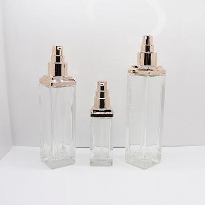 China New Design 4OZ 120ML Unique Luxury Rose Gold Pump Lotion Bottles Cosmetic Glass Clear for sale