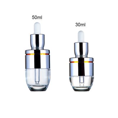 China Cosmetic Free Sample Round Bottom Clear Glass Dropper Bottle 50ml Essential Oil Serum Bottle With Dropper for sale