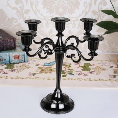 China 5Heads European Metal Candlestick Retro para decoración de hoteles en venta