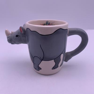 China Viable Custom Ceramic Coffee Mug Novelty Festival Gift With Creative Rhino Shaped Head And Tail for sale