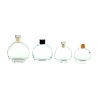 China Round 100ml 150ml 200ml Empty Clear Flat Round 100ml 150ml 200ml Personal Care Perfume Reed Diffuser Glass Bottle for sale