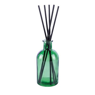 China Empty Green Glass Tubular Oil Diffuser Bottle 250ml Diffuser Bottle Glass Aroma Oil Bottle With Glass Cap for sale