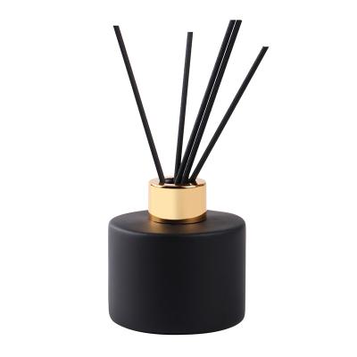 China DIFFUSER black round 100ml 150ml 200ml perfume oil reed diffuser in glass bottle with fiber sticks for sale