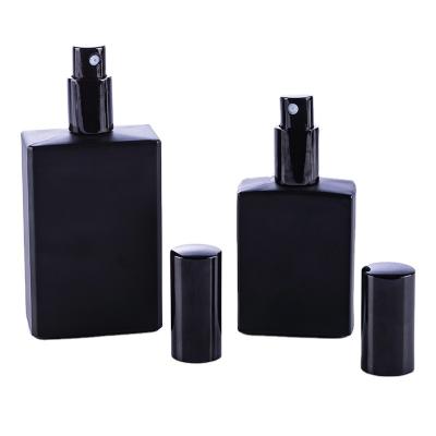 China Perfume 50ml 100ml Square Black Color Glass Perfume Bottle With Spray for sale