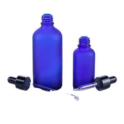 China Cosmetic 5ml 10ml 15ml 20ml 30ml 50ml 100m high quality 1oz frosted blue glass cosmetic bottles for essential oil set for sale