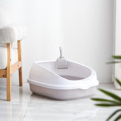 China Small Animals Large Anti Splatter Litter Raised Basin Semi Closed Anti Litter Falling Basin Cat Toilet And Send The Litter Shovel To You for sale