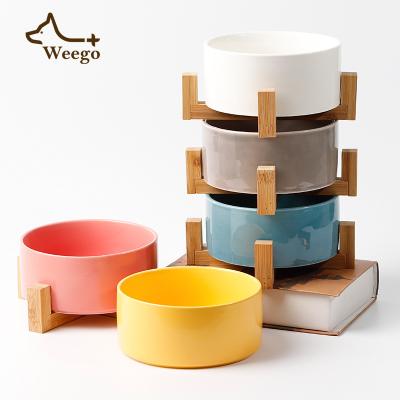 China Weego Round Sustainable Ceramic Dog Cat Bowl Durable Ceramic Food Water Raised Dish For Pet With Wooden Stand Raised Pet Bowls for sale