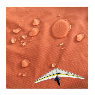 China Air Umbrella PU Vinyl 15d Tear Stop Waterproof Coating Silicone Coated 100% Nylon Fabric For Hammock Parachute Camp Tent for sale