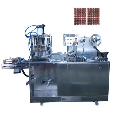 China Food Durable Using Low Price Small Bag Vacuum Fish Food Feed Blister Packaging Machine for sale