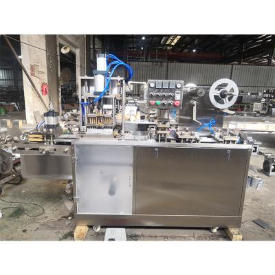 China Full Automatic Food DPB Red Worm Blister Packing Machine for sale