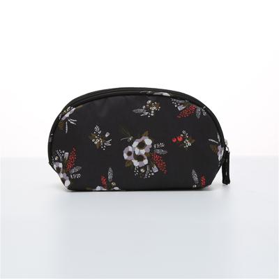 China Custom Wholesale Hot Sale Portable Water Resistant Cotton Canvas Floral PU Pouch Cosmetic Bag for sale