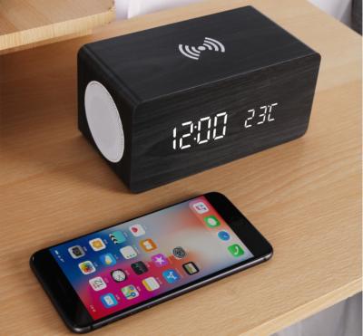 China Wholesale Microphone Bluetooth Speaker With Wireless Charger And Alarm Clock Use For Mobile Phone for sale