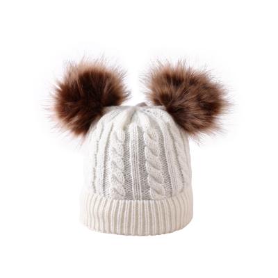 China 2022 COMMON Kids Knitted Hat Wool Winter Hat Kids Knit Faux Fur Ball Kids Winter Hats Pairs for sale