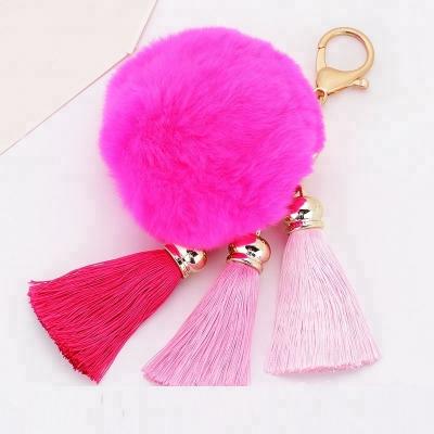 China Real fur ball pompom chains 2021 Amazon main sale big size 18 cm real rabbit warm multicolor rabbit fur pom chain with ice silk tassel for sale