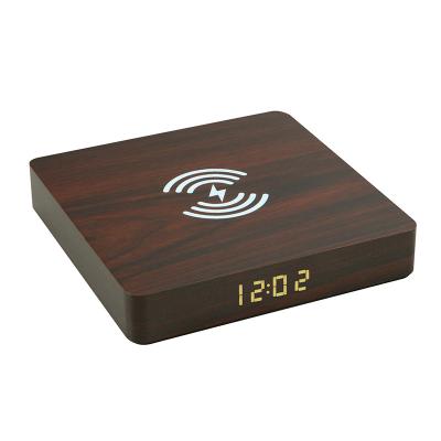 China LED Digital Portable Alarm Clock Charger Qi 10W Desktop Wooden Radio Wireless Charger 2022 for sale