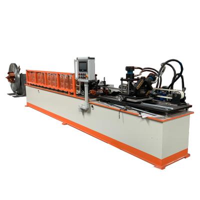 Chine Garment Shops Uwooden Frame Cutting Stud Roll Forming Machine Production Line Steel Window And Door Making Machine à vendre