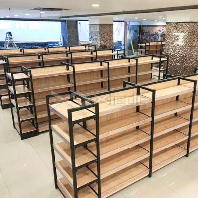 China Corrosion Protection Shop Metal Shelf Fashion Supermarket Wooden Rack Snacks Display Rack for sale