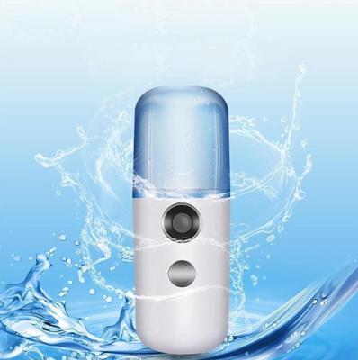 China Portable Handheld Mini Moisturizer Skin Humidifier Moisturizing Nebulizer Steamer 30ml Nano Facial Sprayer for sale