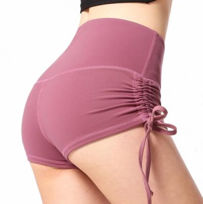 China Custom Antibacterial High Quality Sporty Sexy Ruffle Sweat Pink Workout Women Yoga Running Shorts for sale