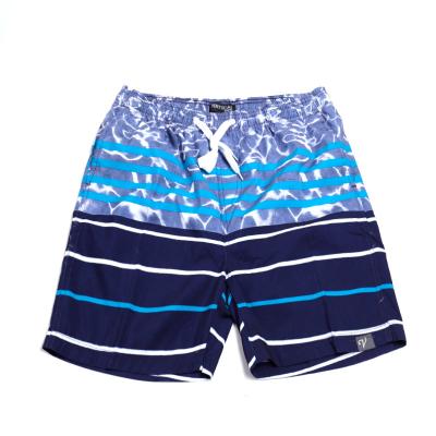 China Custom Viable Gradient Blue Color Stripe Beach Quick Dry Swimming Changing Shorts for sale