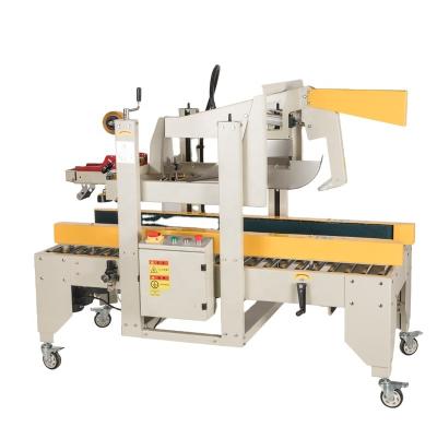 China Automatic food flap carton sealing machine folding carton strip carton box sealing machine for sale