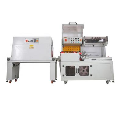 China Food DUOQI DQL-5545+SM-4525 L Bar Heat Sealing And Cutting Sealer Shrink Packing Machine Automatic Shrink Paper Wrapping Machine for sale