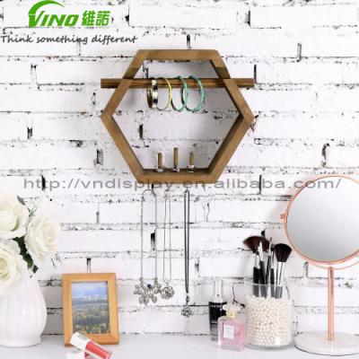 China Showcase Burnt Hexagon Wood Wall Shelf with Bangle Bar, Jewelry Shelf Ring Holder and Brass Hooks for sale