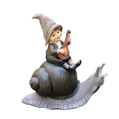 China Europe Resin Boy Statue Sitting On Snail Sculpture 30cm Outdoor Garden Decoration for sale