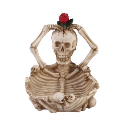 China Rose Ash Tray Cigarette Ashtray Holder Decorative Scary Skull Europe Resin Skull Figurine for sale