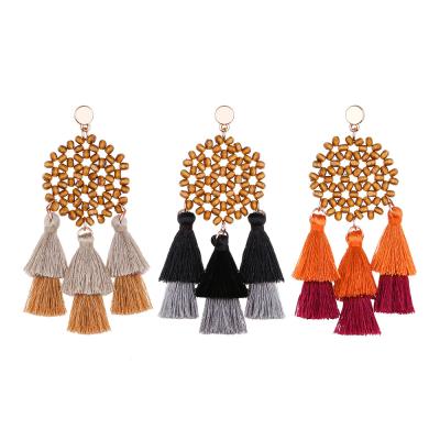 China Romantic Fashion Bohemia Handmade Wooden Beads Drop Earrings To Contrast Color Silk Thread Long Tassel Earring for sale